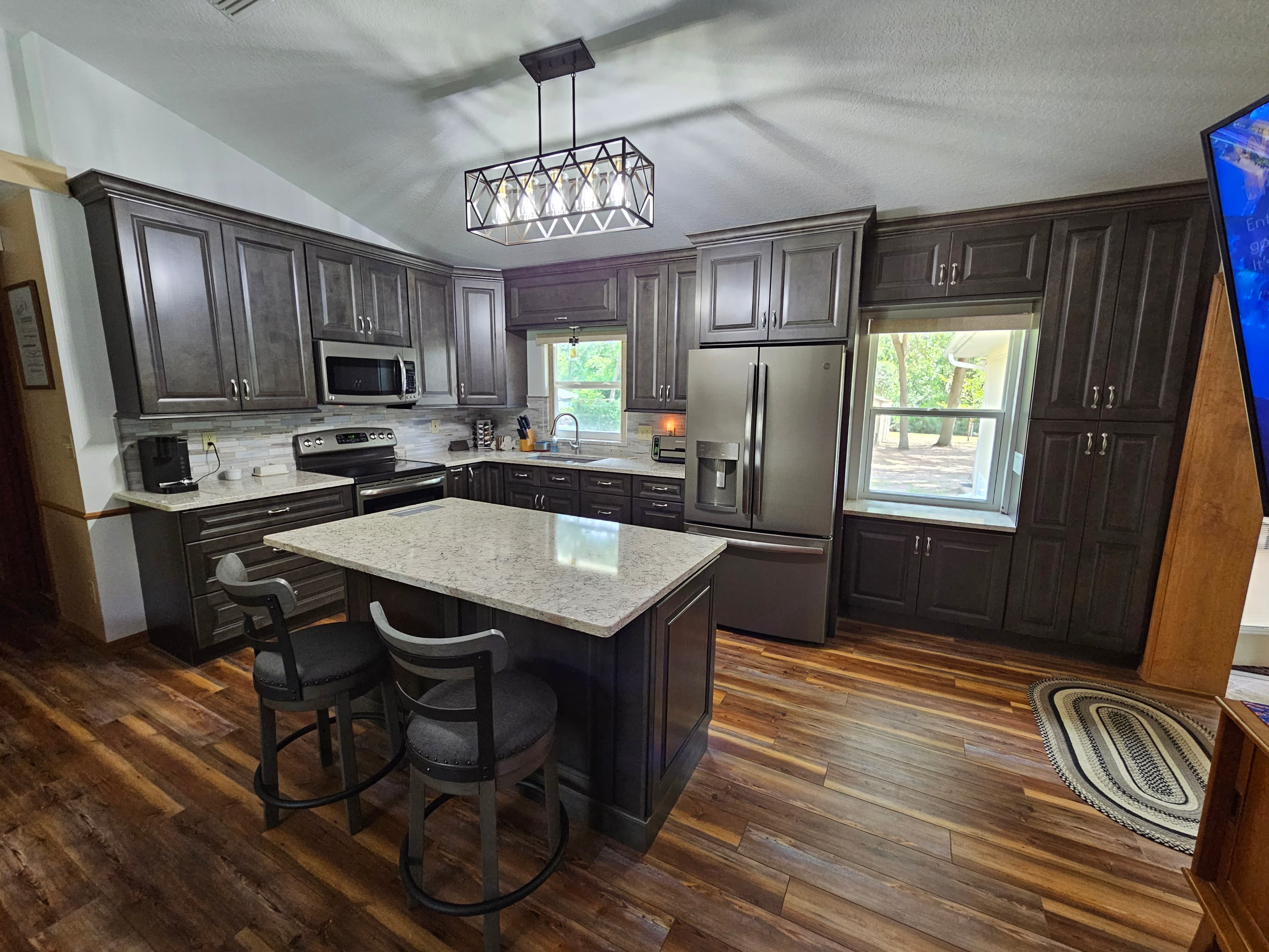 Glide-Lock kitchen - Dark raised panel customer install with Luxury Vinyl Plank Flooring